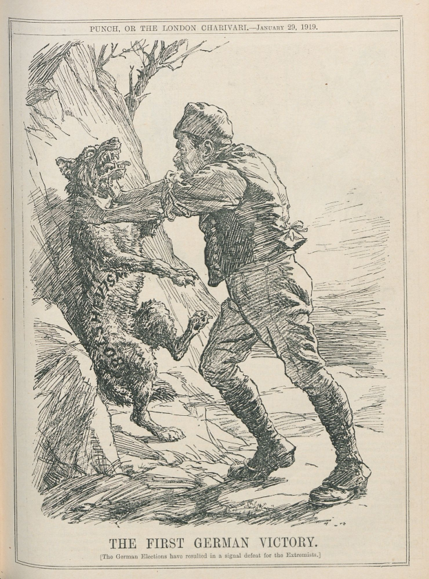 Ein aufgeschlagenes Buch mit einer Zeichnung eines Mannes in Hut mit entschlossener Miene und einem Hund, der neben ihm steht und aufmerksam hochschaut; der Text lautet "Das erste deutsche Sieg."