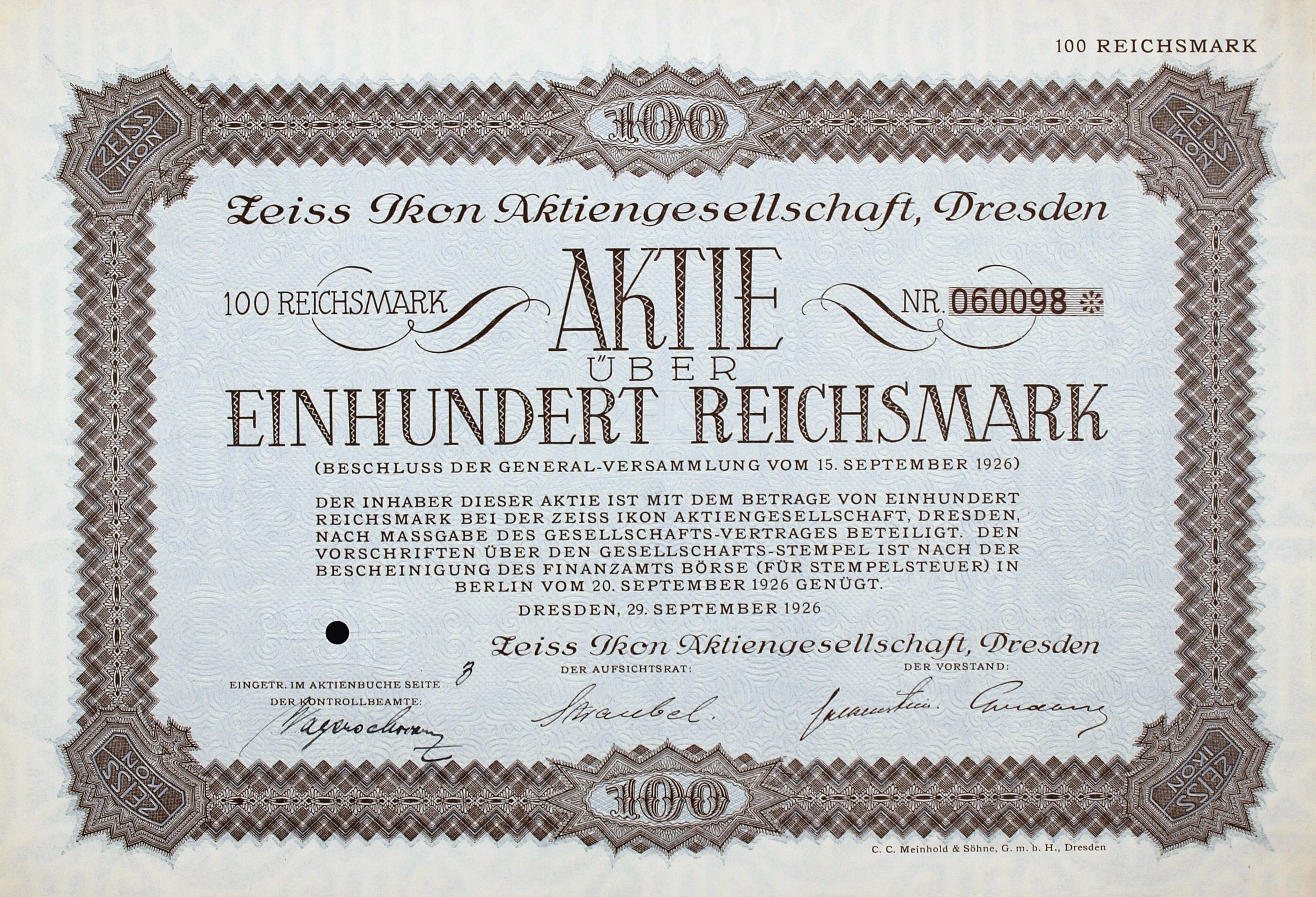 Altes deutsches Aktienzertifikat für 100 Reichsmark mit schwarzem Rand und deutschem Text.