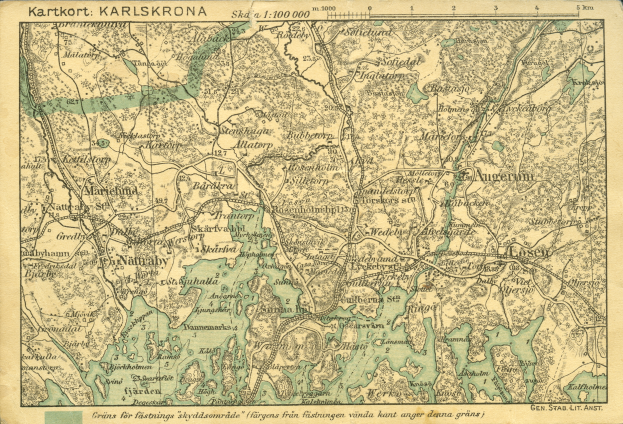 Ein detaillierter alter Stadtplan von Karlsruhe, Deutschland, der Straßen, Gebäude und Sehenswürdigkeiten zeigt, mit Text oben und unten auf dem Papier.
