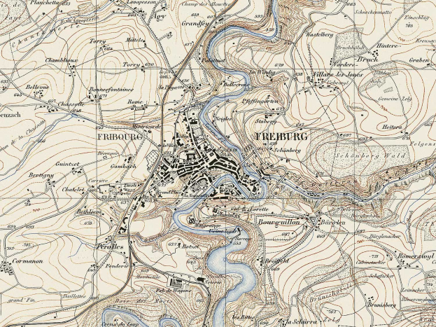 Ein altes topografisches Kartenbild von Freiburg, Deutschland, das einen Fluss, Straßen, Gebäude und Sehenswürdigkeiten zeigt.