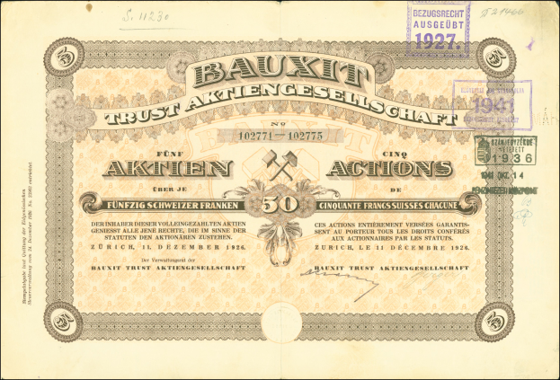Ein alter deutscher Geldschein mit schwarzem Hintergrund, der das Porträt eines Mannes, den Text "Bauxit Trust Aktiengesellschaft" und einen Stempel auf der rechten Seite zeigt.